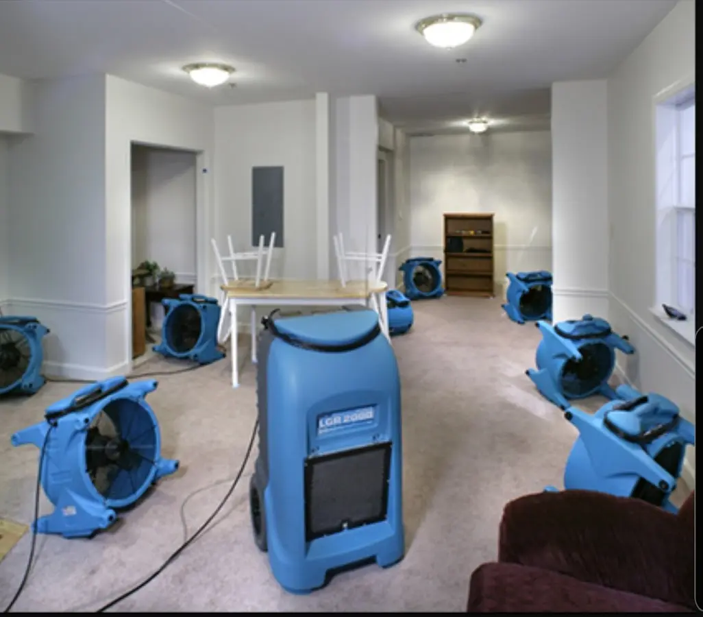 Air movers and dehumidifier setup for Water Damage Restoration in East Kapolei